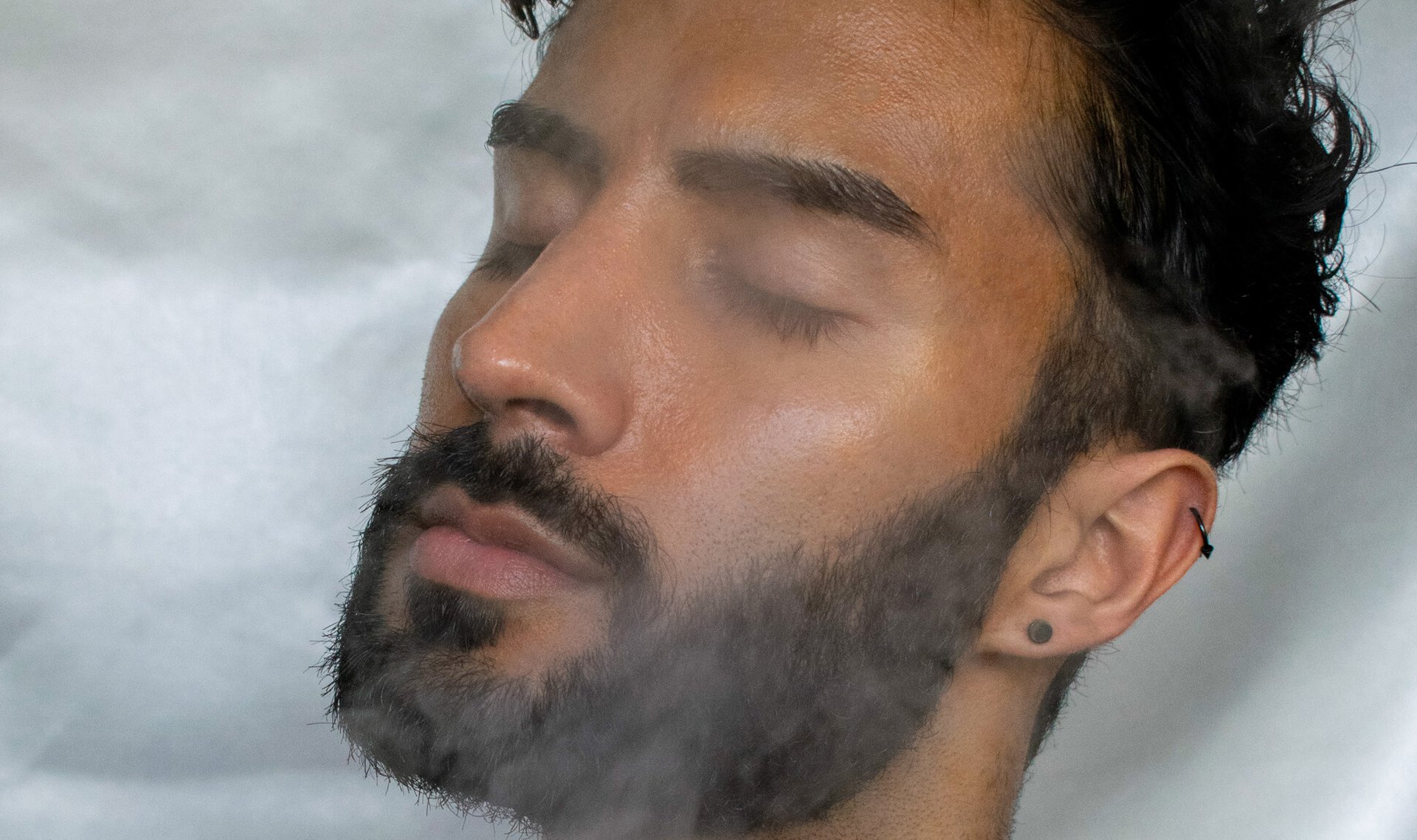 person receiving steam facial