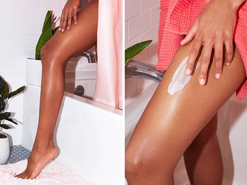 Person applying lotion to their leg while stepping out of bathtub