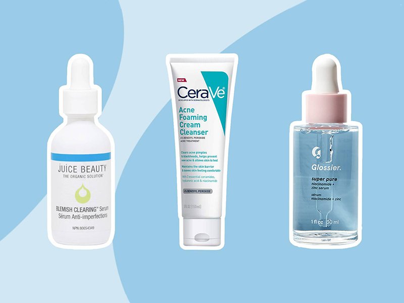 Juice Beauty Blemish Clearing Serum, CeraVe Acne Foaming Cream Cleanser and Glossier Super Pure Niacinamide + Zinc Serum on graphic blue background 
