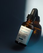 dark skincare serum bottle