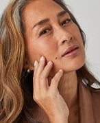 woman touching face