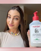 person holding thayers face wash