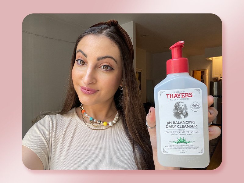 person holding thayers face wash