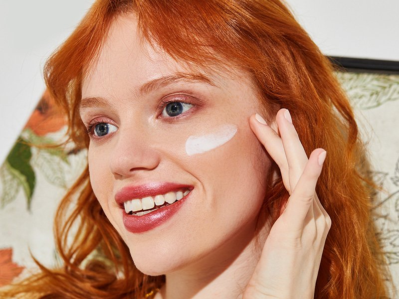 Picture of a model applying face cream