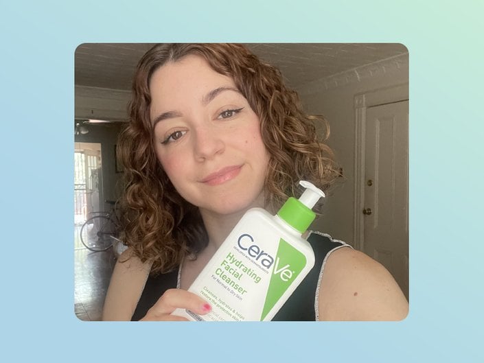 person holding cerave hydrating cleanser