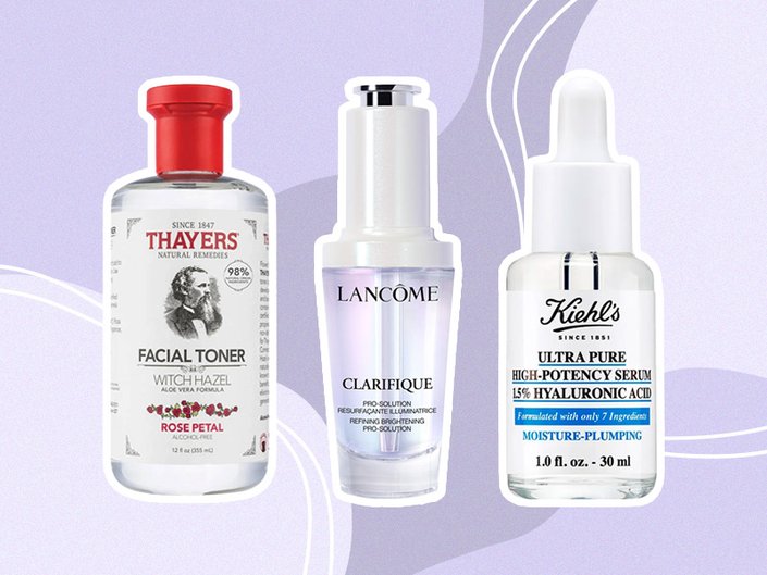 Thayers Rose Petal Facial Toner, Lancôme Clarifique Serum and Kiehl’s Ultra Pure High-Potency 1.5% Hyaluronic Acid Serum on a purple background