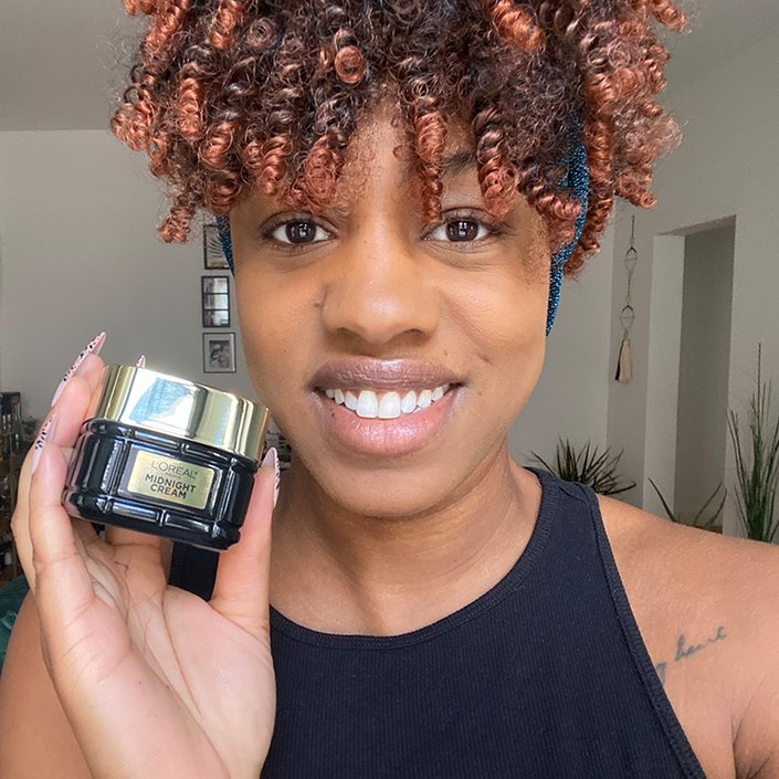 shalwah posing with the l'oreal paris midnight cream