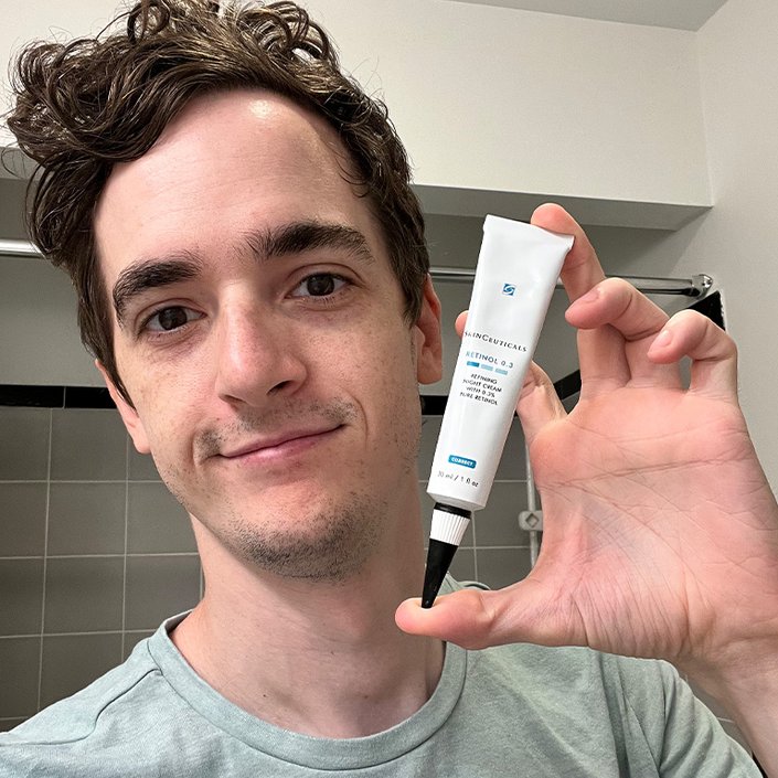 stephen holding the skinceuticals retinol product