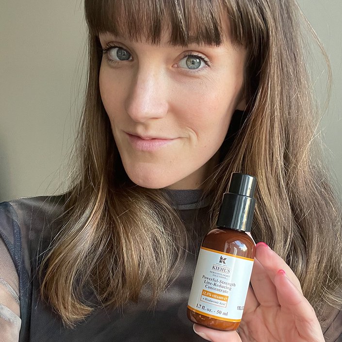 victoria holding the kiehls vitamin c serum