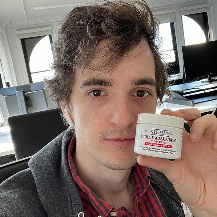 stephen holding the kiehls ultra facial cream
