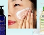 Close-up of a person’s hands rubbing facial cleanser into skin