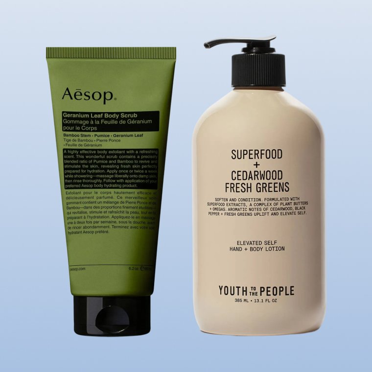 A side-by-side image of a tube of Aēsop Geranium Leaf Body Scrub and a bottle of Youth to the People Superfood Hand + Body Lotion with Plant Butters.