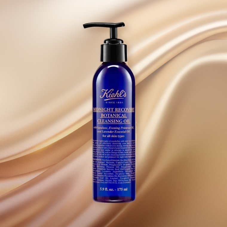 Bottle of Kiehl’s Midnight Recovery Botanical Cleansing Oil on a textured background