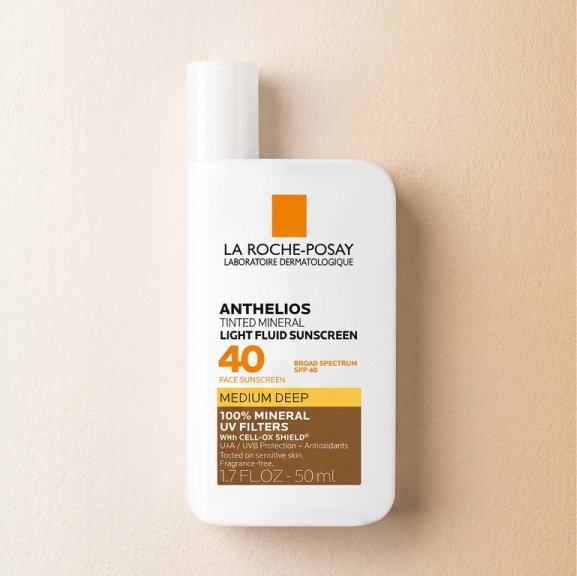 The La Roche-Posay Anthelios Mineral Tinted Sunscreen against a white or neutral, textured background