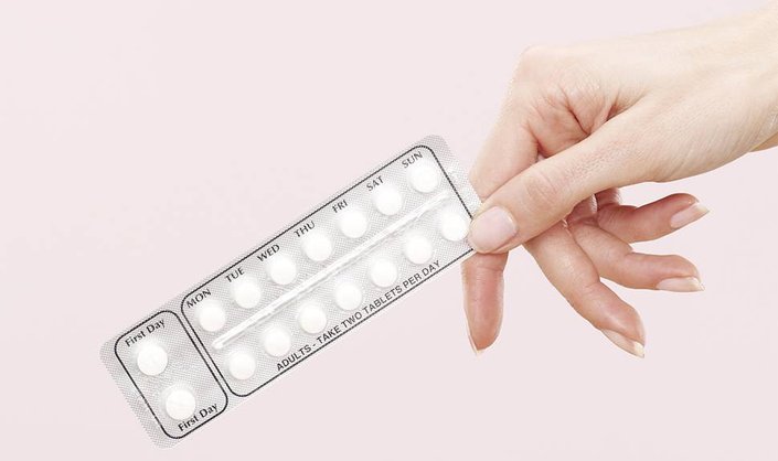 Is There a Link Between Birth Control Pills & Acne? A Dermatologist Explains