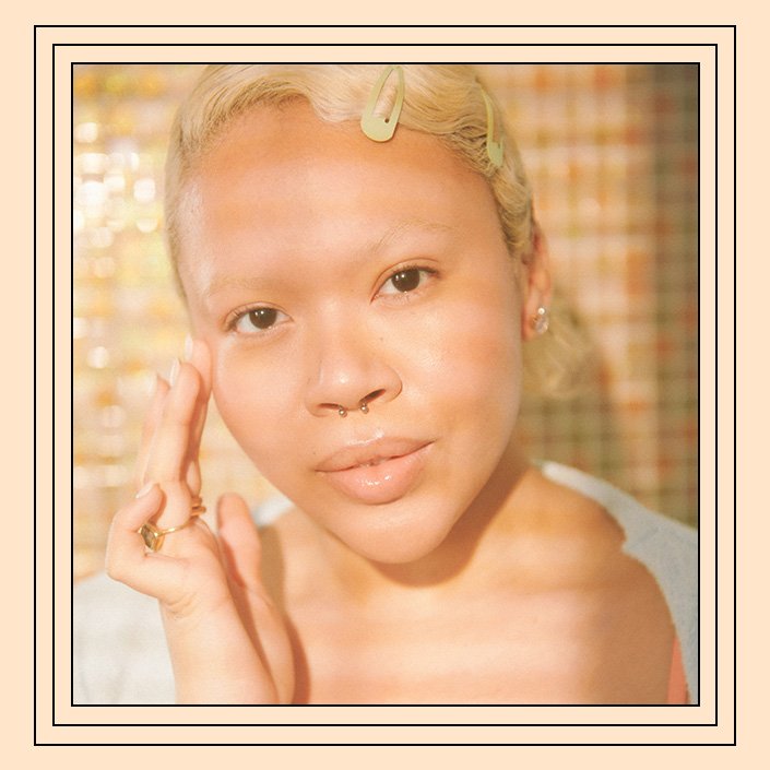 person touching face