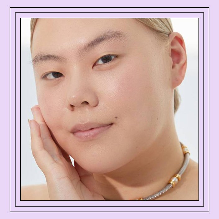 person touching face